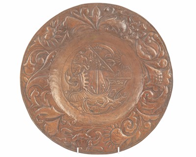 Lot 201 - An Arts and Crafts copper charger, John Pearson style.