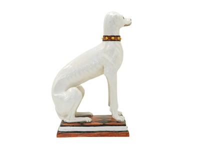 Lot 780 - A remarkable life size Italian faience model of a seated greyhound.