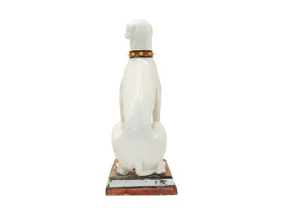 Lot 780 - A remarkable life size Italian faience model of a seated greyhound.