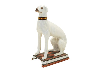 Lot 780 - A remarkable life size Italian faience model of a seated greyhound.