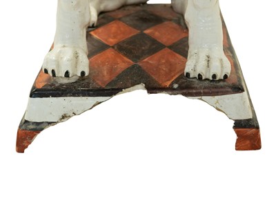Lot 780 - A remarkable life size Italian faience model of a seated greyhound.