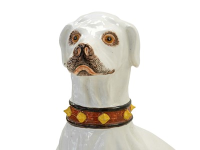 Lot 780 - A remarkable life size Italian faience model of a seated greyhound.