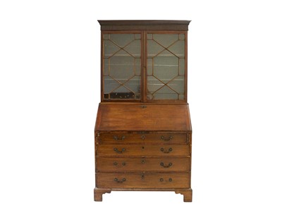 Lot 849 - A George III mahogany bureau bookcase.