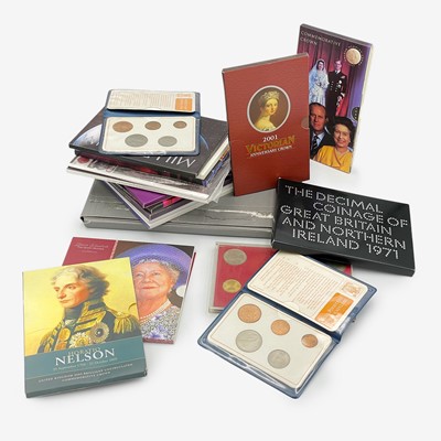 Lot 183 - GB - A collection of 13 commemorative brilliant uncirculated £5 crown coin packs.