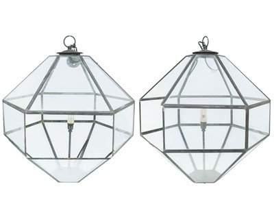 Lot 793 - A pair of glazed hanging light pendants.