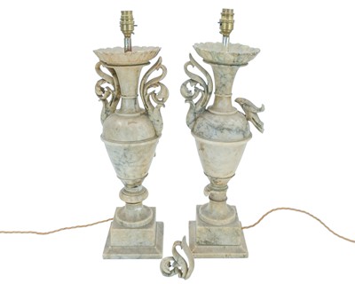 Lot 788 - A pair of Italian alabaster table lamps.
