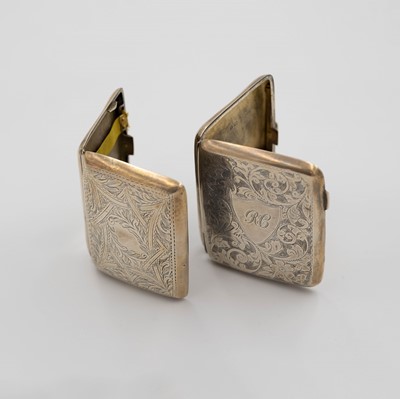Lot 224 - Two silver foliate engraved cigarette cases.