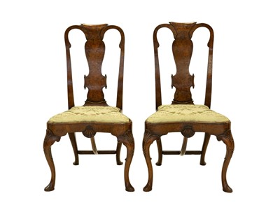 Lot 983 - A pair of Queen Anne style walnut chairs.
