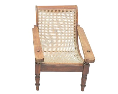 Lot 902 - A late 19th century teak and rattan plantation chair.