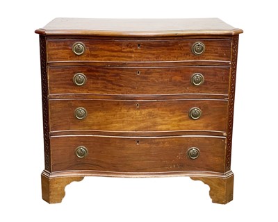 Lot 948 - A George III mahogany serpentine front chest.