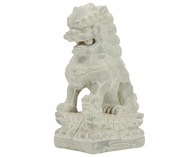 Lot 425 - A Chinese carved stone guardian foo dog.