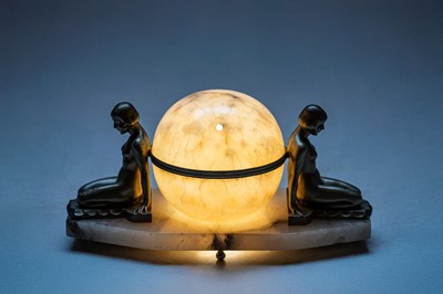 Lot 506 - An Art Deco alabaster table lamp.