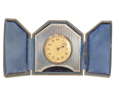 Lot 193 - A hallmarked silver travel clock.