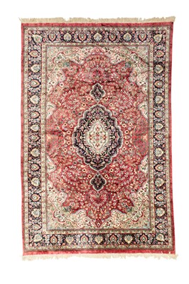 Lot 473 - A Kashmir silk piled carpet.