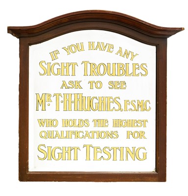 Lot 529 - A framed opticians advertising mirror.