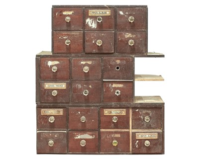 Lot 661 - A part run of 20 Victorian mahogany apothecary drawers.