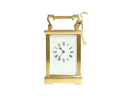 Lot 778 - A French brass carriage timepiece.