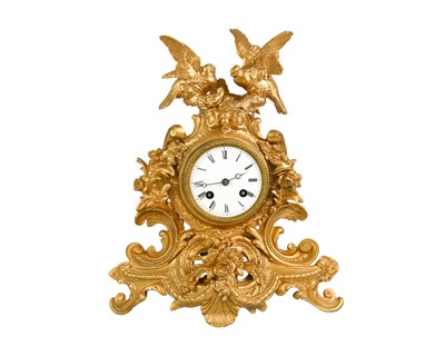 Lot 768 - A French gilt spelter mantel clock.