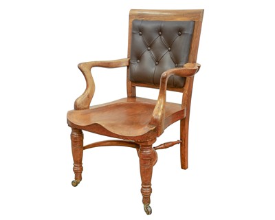 Lot 947 - A Victorian walnut desk chair.