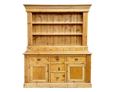 Lot 969 - A pine kitchen dresser.