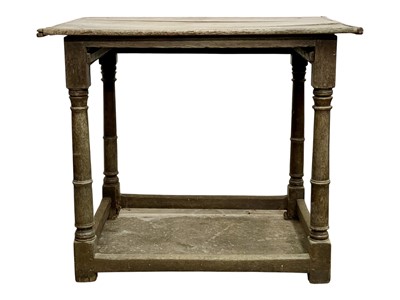 Lot 686 - A 17th century oak side table.
