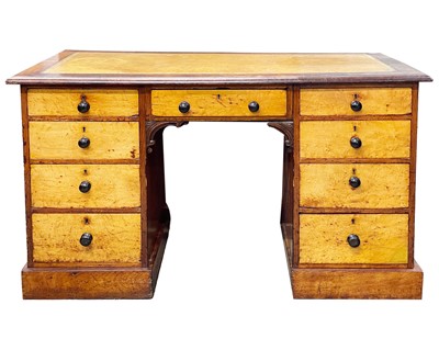 Lot 912 - A late Victorian mahogany and satinwood kneehole writing desk.
