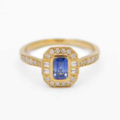 Lot 126 - A 9k Art Deco style rectangular step-cut blue sapphire and diamond set ring.