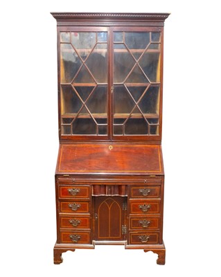 Lot 959 - A George III mahogany and inlaid bureau bookcase.