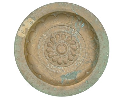 Lot 727 - A 17th century Nuremberg brass alms dish.