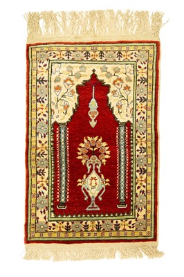 Lot 479 - A Persian silk prayer mat.