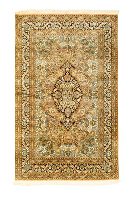 Lot 493 - A Persian silk rug.