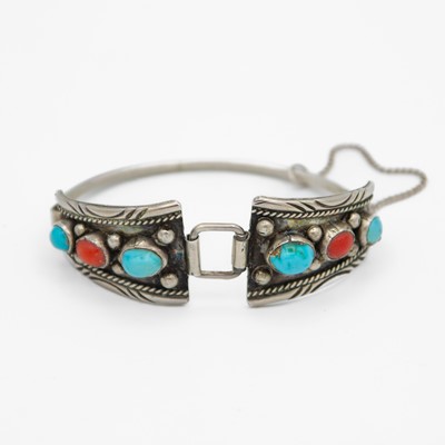 Lot 91 - A native American Navajo silver turquoise and coral set bracelet, probably by Jerome Begay.