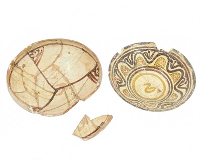 Lot 645 - Two Islamic Persian pottery bowls.