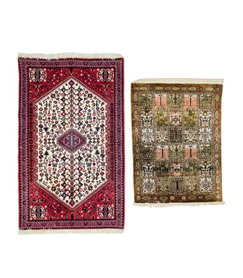 Lot 464 - An Iranian handknotted silk prayer mat.