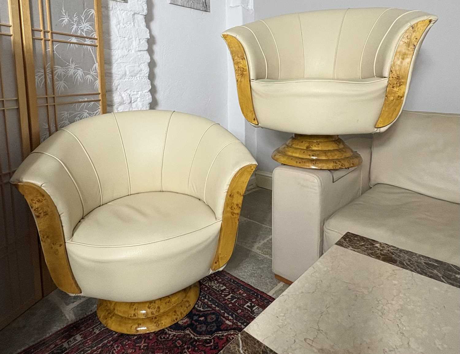 Lot 284 - A pair of extravagant swivel chairs