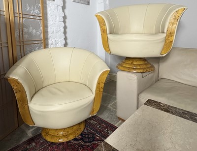 Lot 284 - A pair of extravagant swivel chairs