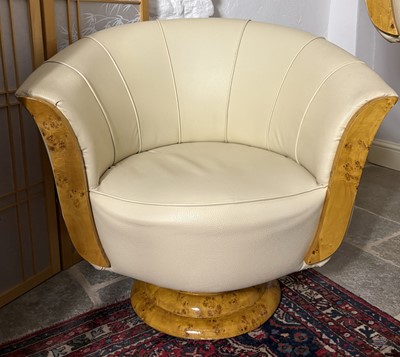Lot 284 - A pair of extravagant swivel chairs