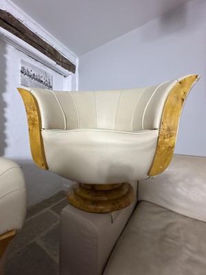 Lot 284 - A pair of extravagant swivel chairs