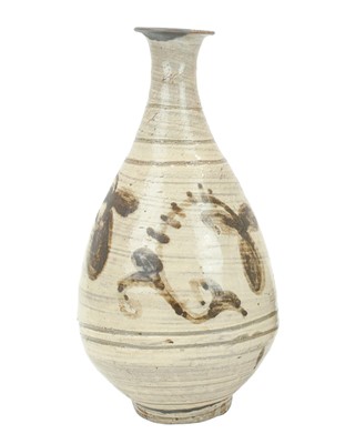 Lot 631 - A Korean Buncheong ware bottle vase.