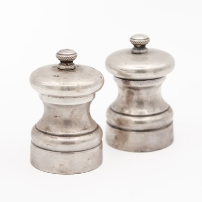 Lot 102 - A pair of modern silver salt and pepper mills.
