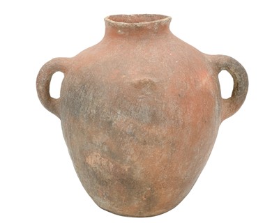 Lot 603 - A North African twin handled olive jar.