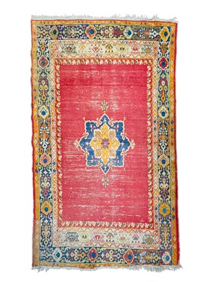 Lot 478 - An antique Ushak rug.
