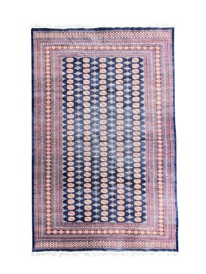 Lot 476 - A Pakistan Bokhara carpet.