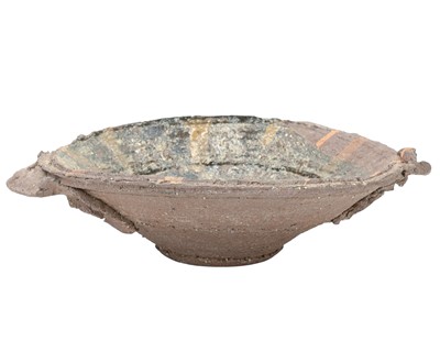 Lot 597 - Peter SMITH (1941-2025), a slip decorated bowl.