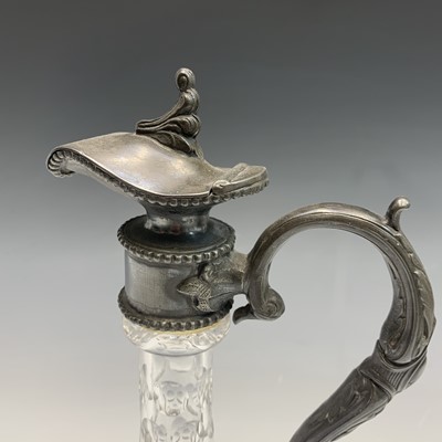 Lot 924 - A Victorian glass claret jug with ornate EPBM...