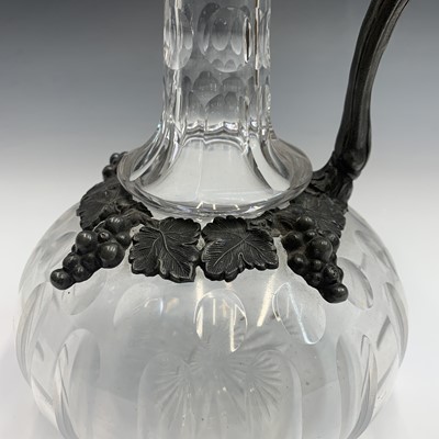 Lot 924 - A Victorian glass claret jug with ornate EPBM...