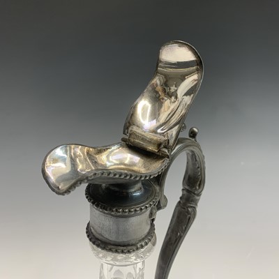 Lot 924 - A Victorian glass claret jug with ornate EPBM...