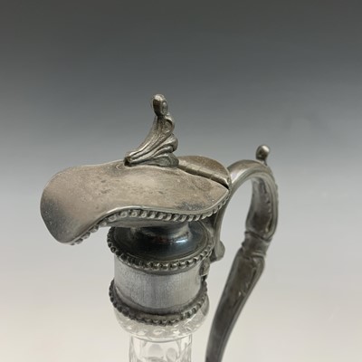 Lot 924 - A Victorian glass claret jug with ornate EPBM...