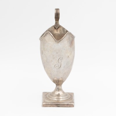 Lot 125 - A George III silver helmet cream jug by George Gray.