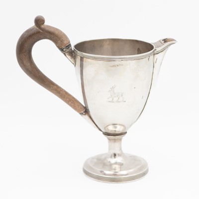 Lot 128 - A George III silver pedestal cream jug, possibly by Henry Chawner.